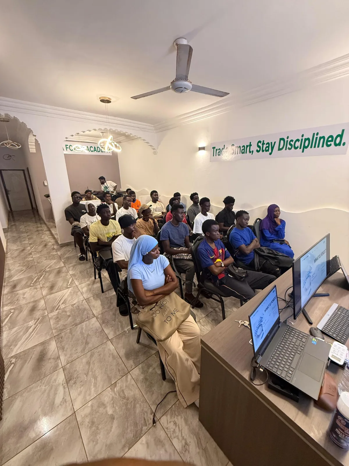 Students listening during a "What is Forex" lesson